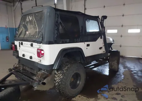 2002 Jeep Wrangler Sport from USA, damaged, VIN 1J4FA49S02P702018